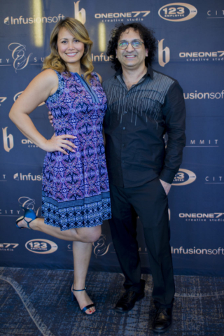 a woman and a guy at red carpet